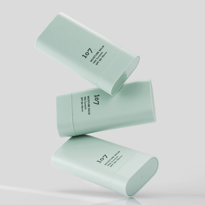 107 Moisture Balm Mild Sun Stick SPF50+PA++++ in light green packaging
