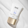 AHC Masters Mela Protect Waterfull Sunscreen 40ml tube against a soft background, showcasing SPF 50+ protection and premium packaging.