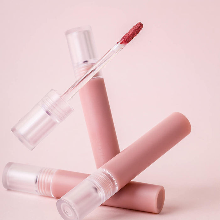AND:AR Matte Lip Color in soft pink tone with applicator, perfect for long-lasting wear and vibrant color. Ideal for beauty enthusiasts.