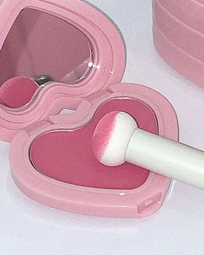 AOU Soft Cream Blush in heart-shaped pink compact with applicator for a natural, soft glow.