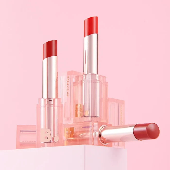 BANILA CO Glow Veil Lipstick in vibrant pink packaging, showcasing rich color and shine.