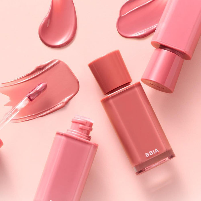 BBIA Glow Tint - various shades of BBIA Glow Tint bottles and swatches on a soft background. Enhance your lip color and shine.