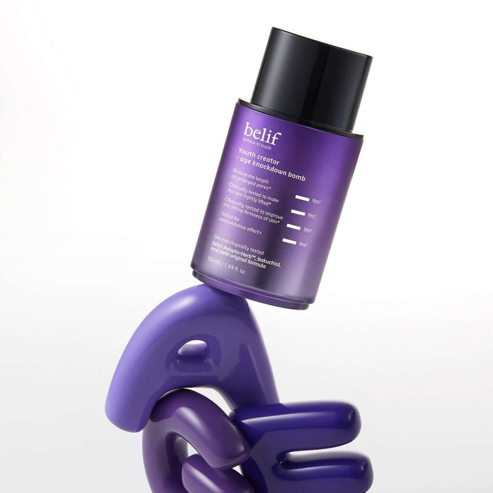 BELIF Age Knockdown Bomb Serum 50ml bottle on a unique display stand.