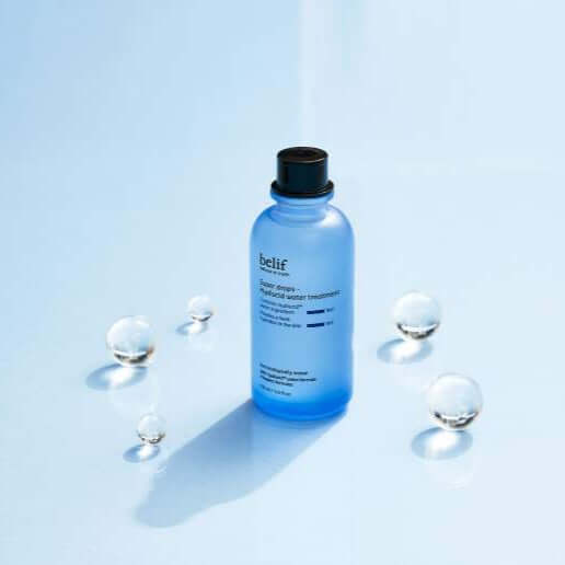 BELIF Super Drops-Hyalucid Water Treatment 150ml product image on blue background with water droplets