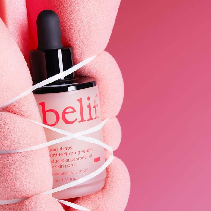 BELIF Super Drops Peptide Firming Serum 30ml in pink packaging, highlighting firming properties.