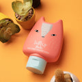 BELLBOY STUDIO Daily Cooper Moist Multi Lotion 160ml with playful packaging, displayed next to potted plants on an orange surface.