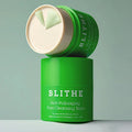 BLITHE Anti-Polluaging Pore Cleansing Balm in green container on teal background