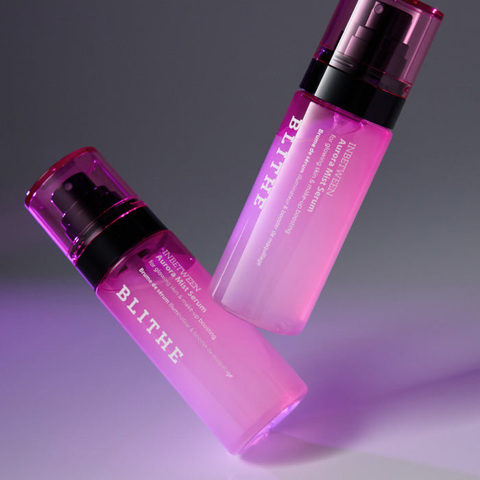 Two bottles of BLITHE Inbetween Aurora Mist Serum 82ml with purple packaging.