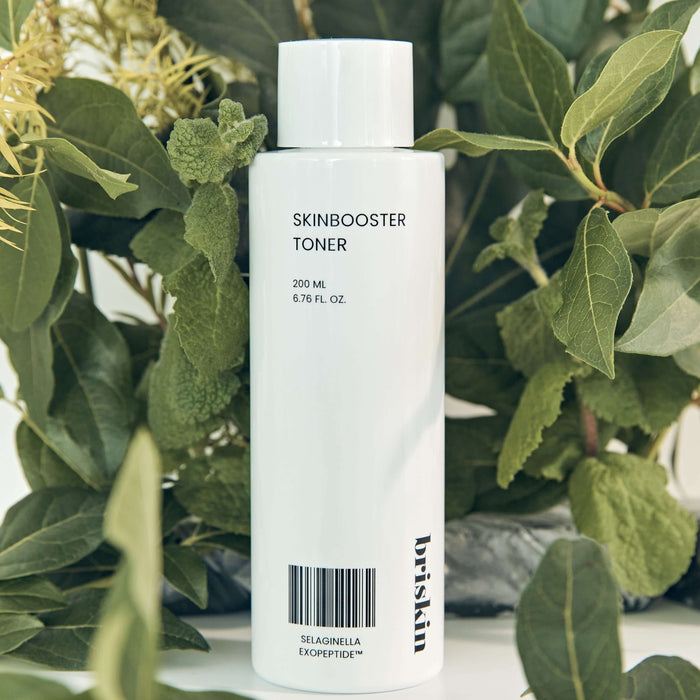 BRISKIN Selaginella Exopeptide Toner 200ml with lush green foliage background