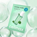 CELIMAX Cica Serum Mask 10 Sheets package with green hydrating and calming design, featuring product and bubbles in the background.