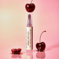 COSIERO Vivid Lip Marker in vibrant cherry shade with fresh cherries backdrop.
