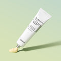COSRX The Retinol 0.1 Cream 20ml tube on green background with cream dispensed
