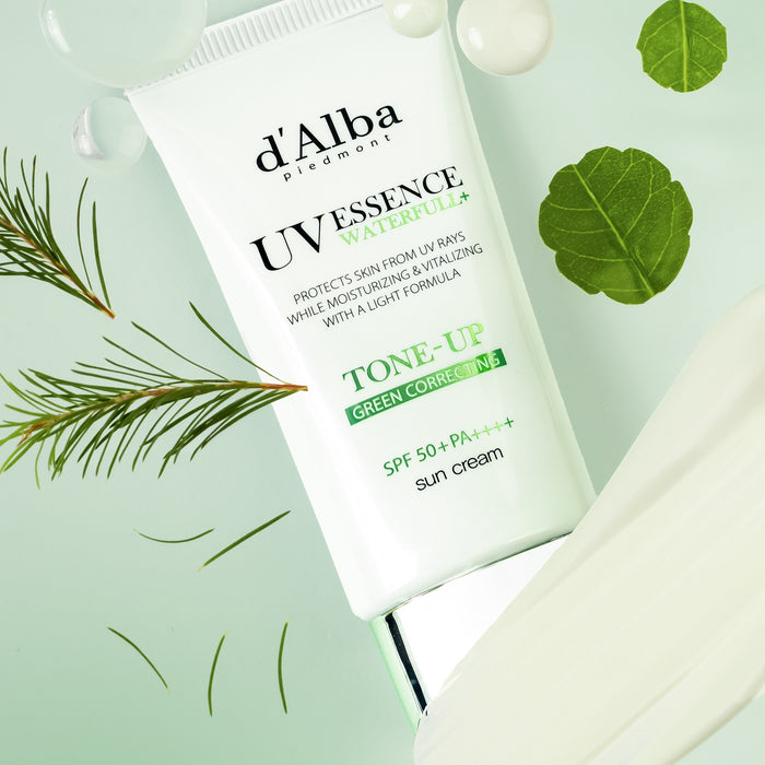 D'ALBA Vegan Waterfull Green Tone-Up Suncream 50ml packaging displayed with green leaves and droplets.