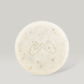 DONGGUBAT Field Correct Body Soap Noni bar with embossed design on a neutral background. Enhance skincare routine with natural ingredients.