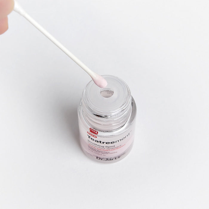 Close-up of DR. JART+ Ctrl-A Teatreement Soothing Spot 15ml jar with cotton swab