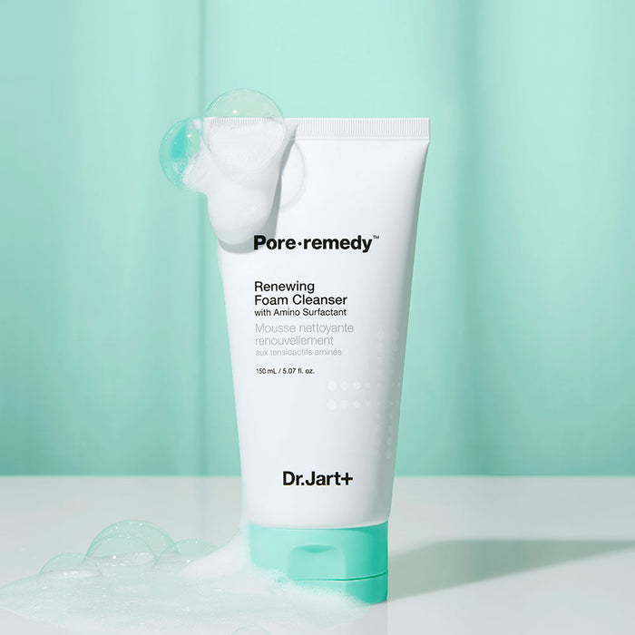 DR. JART+ Pore Remedy Renewing Foam Cleanser 150ml tube with foam bubbles against green background