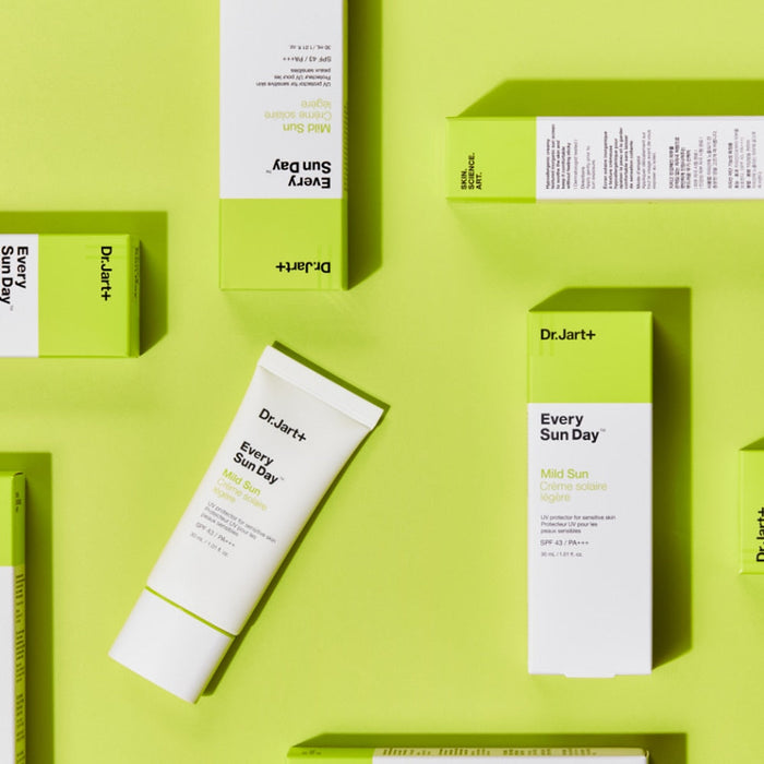 DR.JART+ Every Sun Day Mild Sun 30ml sunscreen tube and packaging over green background