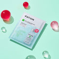FATION Nosca9 Trouble Serum Mask on a mint background with colorful orbs, highlighting skincare benefits and packaging.