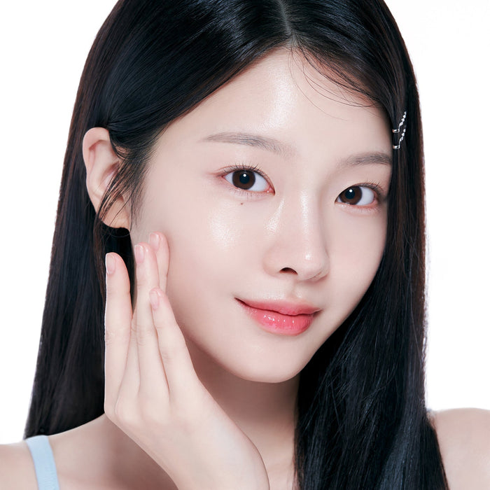 Woman applying FORENCOS Plum C Mild Mild Acidic Toner 300ml to her face, highlighting skincare benefits.