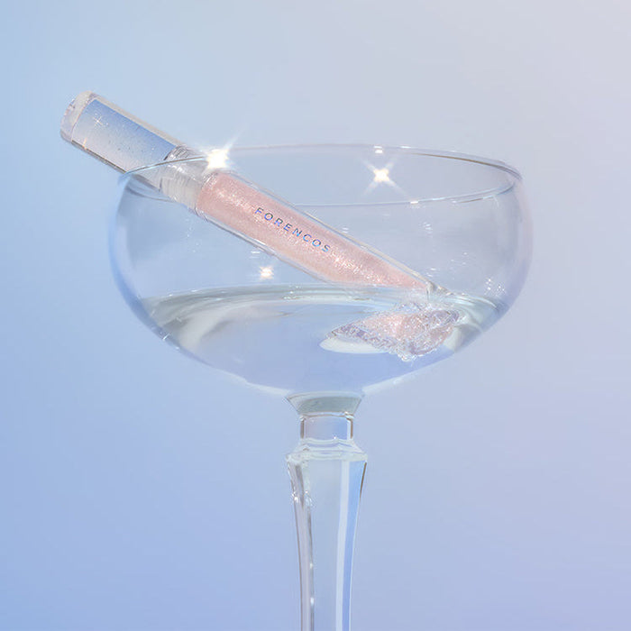 FORENCOS Starlight Liquid Glitter luxury design displayed in an elegant glass setting, showcasing its shimmering effect.