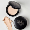 HANSKIN Blemish Cover Blur Pact with open compact and powder swatch on white background.