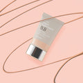 HANSKIN Super Light Touch BB 30g cream on a peach background, highlighting its lightweight, smooth coverage for radiant skin.