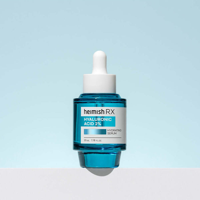 HEIMISH RX Hyaluronic Acid Hydrating Serum 35ml bottle with blue liquid and dropper, standing against a light background.
