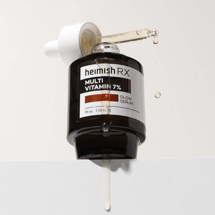 HEIMISH RX Multi Vitamin Glow Serum 35ml with dropper shown releasing serum against white background.