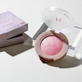 HINCE True Dimension Glow Cheek in pink shade with packaging, highlighting its luminous texture for a radiant look.