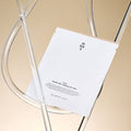 HUXLEY BioSIS 360 Wrapping Gel Mask 35g on transparent stand