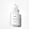 HUXLEY Essence Brightly Ever After 30ml skincare bottle with dropper for radiant skin care routine.