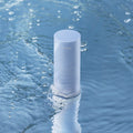 HUXLEY Sun Stick Watery Touch 20g in water, showcasing waterproof sun protection and hydrating benefits in a sleek design.