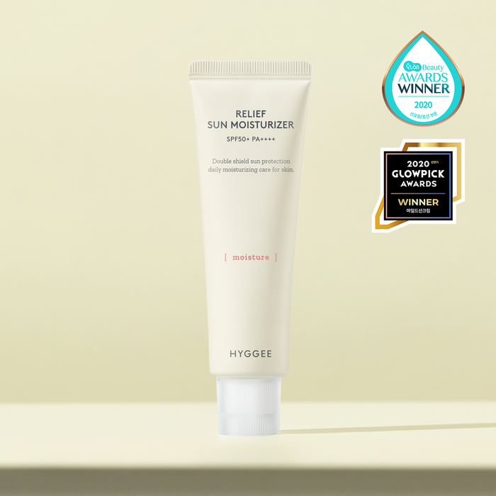 HYGGEE Relief Sun Moisturizer SPF50+ 50ml tube with award labels for daily sun protection and moisture.
