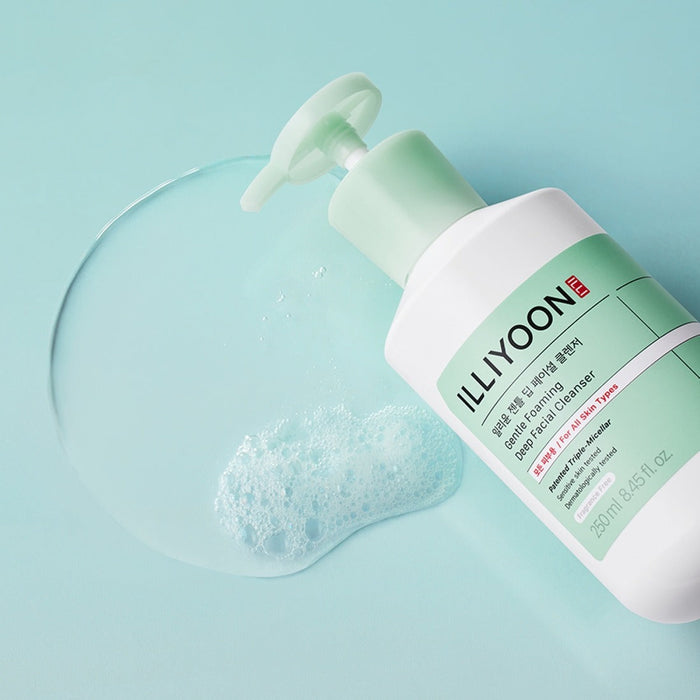 Bottle of ILLIYOON Gentle Deep Facial Cleanser 250ml with foamy texture on a mint background