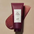 I'M FROM Fig Body Scrub 200ml tube on beige background with exfoliating scrub