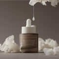 I'M FROM Mushroom Collagen Ampoule 30ml with dropper and white floral decoration.