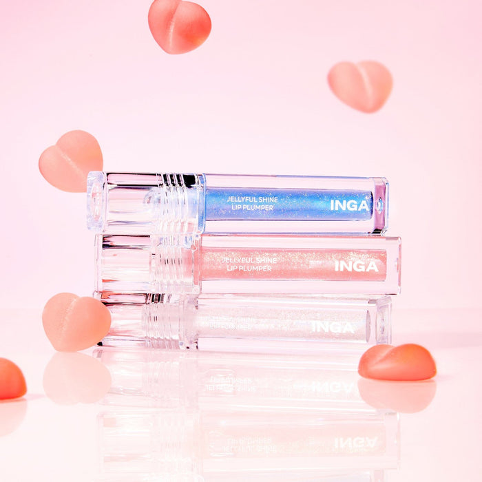 INGA Jellyful Shine Lip Plumper products with pink and blue shades on a pink background.