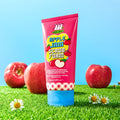 IT'S SKIN Apple Jam Scrub Foam 120ml in a vibrant outdoor setting with apples and daisies, highlighting natural ingredients and skincare benefits