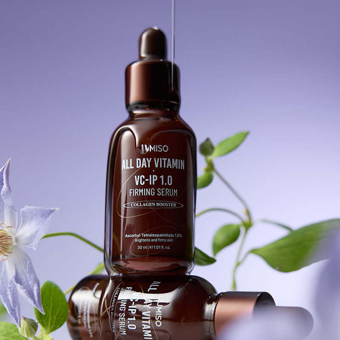 JUMISO All Day Vitamin VC-IP 1.0 Elasticity Serum bottle with floral background