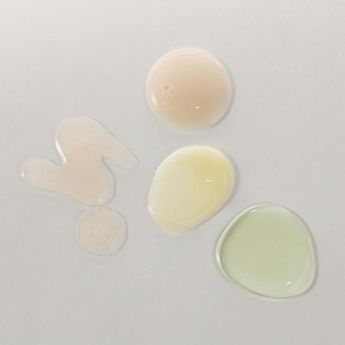 Texture swatches of KAINE Serum Discovery Kit on white background.