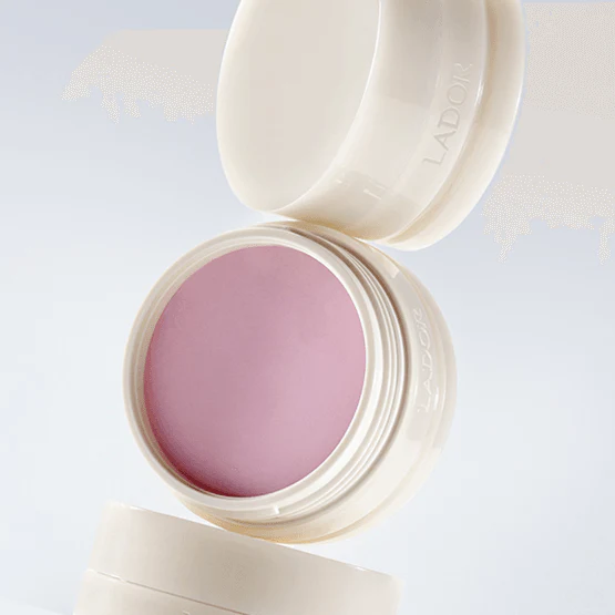 LADOR Body Multi Balm 30g, moisturizing balm in open container showcasing pink product inside.