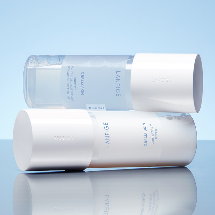 LANEIGE NEW Gel Cream Skin 170ml product packaging displayed on a reflective surface against a blue background.
