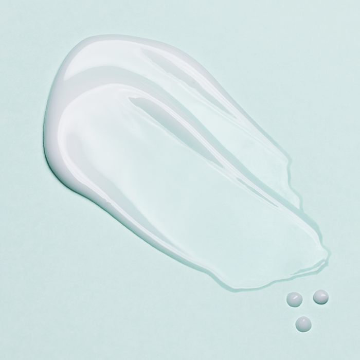 Texture of LANEIGE Smoothie Makeup Serum 30ml on light background