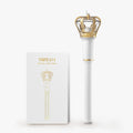 White and gold LOONA Official Light Stick with packaging displayed on a white background