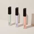 Three tubes of LUNA Long Lasting Corrector in different shades against a neutral background.