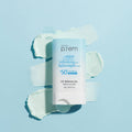 MAKE P:REM UV Defense Me Watery Sun Stick 18g SPF50+ PA++++ on a textured background showcasing product texture.