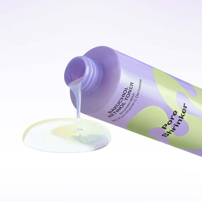 MAMONDE Pore Shrinker Bakuchiol Retinol Toner 200ml bottle pouring liquid on a surface. Skincare product.