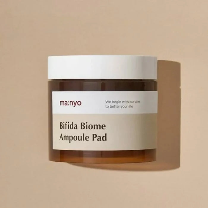 MANYO Bifida Biome Ampoule Pad 70 Sheets jar on beige background