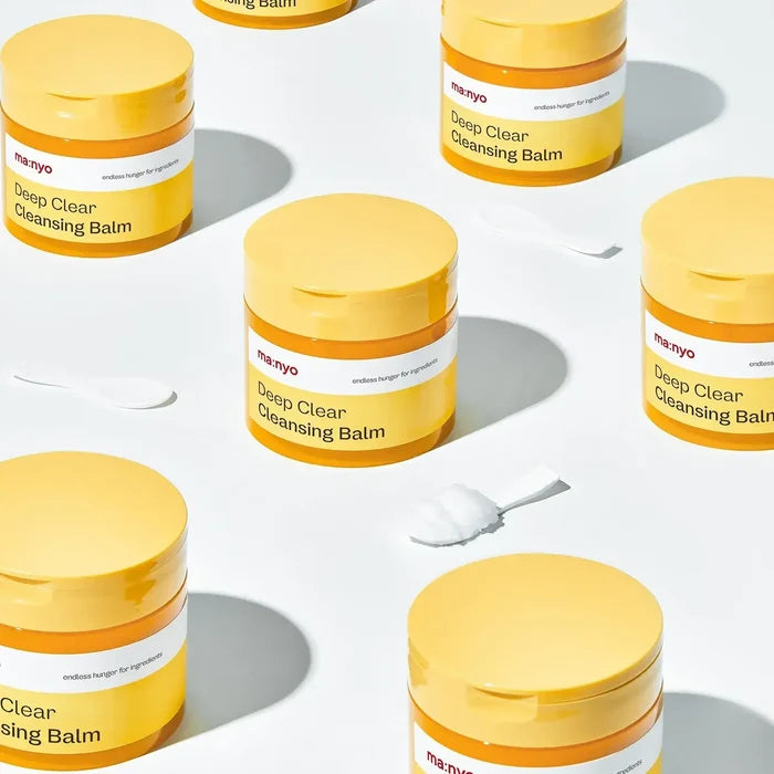MANYO Deep Clear Cleansing Balm 132ml jars displayed with spatula on a white background.