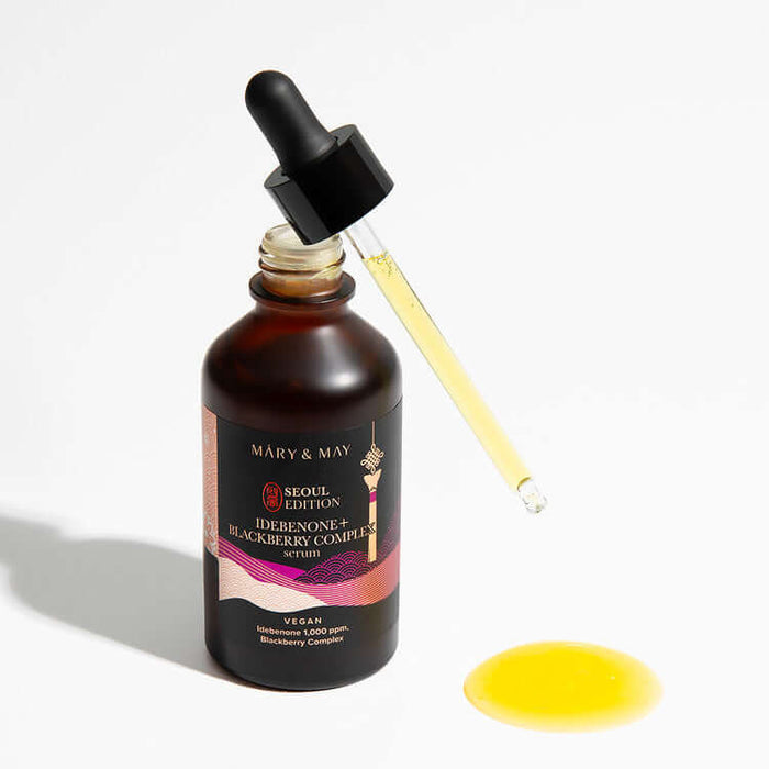 MARY & MAY Idebenone+Blackberry Complex Serum, vegan skincare product with dropper.